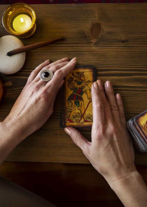 top-view-woman-reading-tarot